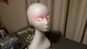 Polystyrene head with laser eyes